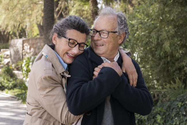 senior-couple4-fp Smiling senior couple embracing illustrates blog "Medicare Advantage: What Are Health Maintenance Organizations (HMOs)?"