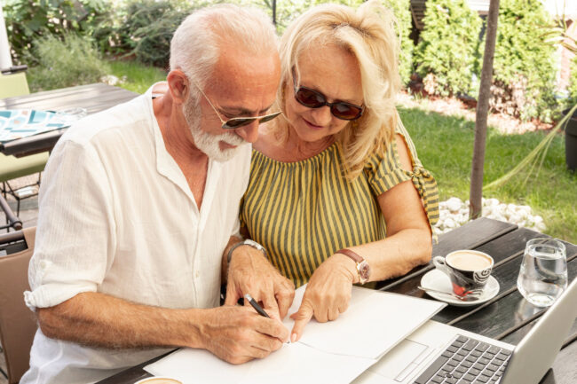 Senior couple reviewing Medicare Advantage plans in California