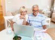 senior couple doing Medicare plan review to save money